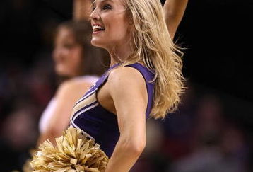 PORTLAND, OR - MARCH 19:  A Washington Huskies cheerleader performs on the court while taking on the Mississippi State Bulldogs during the first round of the NCAA Division I Men's Basketball Tournament at the Rose Garden on March 19, 2009 in Portland, Oregon.  (Photo by Jonathan Ferrey/Getty Images)