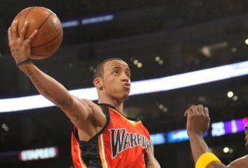 LOS ANGELES, CA - MARCH 19:  Monta Ellis #8 of the Golden State Warriors goes up with the ball against Lamar Odom #7 of the Los Angeles Lakers on March 19, 2009 at Staples Center in Los Angeles, California.  The Lakers won 114-106.  NOTE TO USER: User expressly acknowledges and agrees that, by downloading and/or using this Photograph, user is consenting to the terms and conditions of the Getty Images License Agreement.  (Photo by Stephen Dunn/Getty Images)