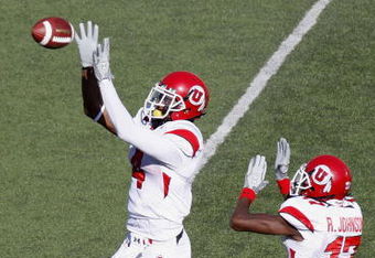 ANN ARBOR, MI - AUGUST 30: Sean Smith #4 of the Utah Utes intercepts a second quarter pass in front of teammate Robert Johnson #17 while playing the Michigan Wolverines on August 30, 2008 at Michigan Stadium in Ann Arbor, Michigan.  (Photo by Gregory Shamus/Getty Images)