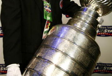 MONTREAL- JANUARY 23:  Steve Poirier of the Hockey Hall of Fame arrives with the Stanley Cup at The Hockey News / NHL All-Star party at Gare Dalhousie as part of the 2009 NHL All-Star Weekend on January 23, 2009 in Montreal, Quebec. (Photo by Phillip MacCallum/Getty Images)