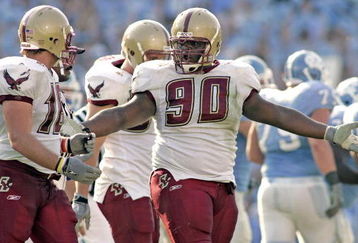 CHAPEL HILL, NC - NOVEMBER 5:  B.J. Raji #90 and Brian Toal of the Boston College Eagles talk after giving up a field goal to the North Carolina Tar Heels during an Atlantic Coast Conference game on November 5, 2005 at Kenan Stadium in Chapel Hill, North Carolina. North Carolina defeated Boston College 16-14.  (Photo by Grant Halverson/Getty Images)