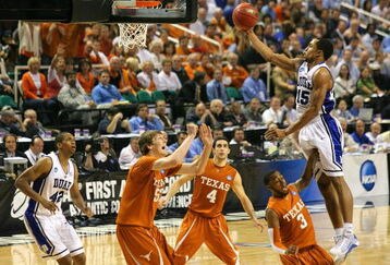 GREENSBORO, NC - MARCH 21:  Gerald Henderson #15 of the Duke Blue Devils lays in a basket against A.J. Abrams #3 and Clint Chapman #53 of the Texas Longhorns during the second round of the NCAA Division I Men's Basketball Tournament at the Greensboro Coliseum on March 21, 2009 in Greensboro, North Carolina.  (Photo by Streeter Lecka/Getty Images)