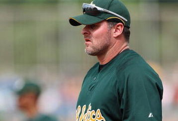 MESA, AZ - MARCH 03:  Jason Giambi #16 of the Oakland Athletics fields first base during the spring training game against the Chicago Cubs at HoHoKam Park on March 3, 2009 in Mesa, Arizona.  The Cubs defeated the A's 6-4.  (Photo by Christian Petersen/Getty Images)