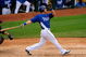 SURPRISE, AZ - MARCH 03:  Alex Gordon #4 of the Kansas City Royals follows through on a grand slam home run against Cleveland Indians during the fifth inning of a spring training game at the Surprise Stadium on March 3, 2009 in Surprise, Arizona.  (Photo by Kevork Djansezian/Getty Images)