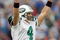 NASHVILLE, TN - NOVEMBER 23:  Quarterback Brett Favre #4 of the New York Jets celebrates on the field during the game against the Tennessee Titans at LP Field on November 23, 2008 in Nashville, Tennessee. (Photo by Kevin C. Cox/Getty Images)