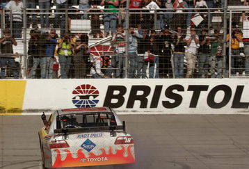 BRISTOL, TN - MARCH 22:  Kyle Busch, driver of the #18 Snickers Toyota, celebrates winning the NASCAR Sprint Cup Series Food City 500 at Bristol Motor Speedway on March 22, 2009 in Bristol, Tennessee.  (Photo by Jerry Markland/Getty Images for NASCAR)