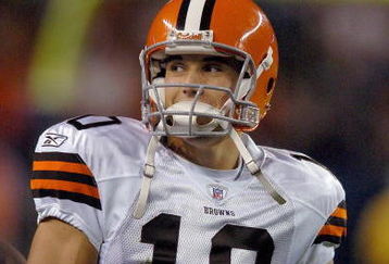 DENVER - AUGUST 25:  Quarterback Brady Quinn #10 of the Cleveland Browns gets the play from the sidelines in the second half of the pre-season football game against the Denver Broncos on August 25, 2006 at Invesco Field at Mile High in Denver, Colorado.  (Photo by Steve Dykes/Getty Images)