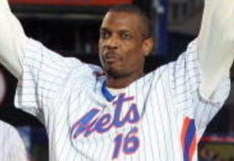 NEW YORK - SEPTEMBER 28: Former New York Met Dwight Gooden waves to the crowd during post game ceremoies after the Mets played the Florida Marlins in the last regular season baseball game ever played in Shea Stadium on September 28, 2008 in the Flushing neighborhood of the Queens borough of New York City. The Mets plan to start next season at their new stadium Citi Field after playing in Shea for over 44 years. (Photo by Jim McIsaac/Getty Images)