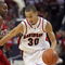 CHARLOTTE, NC - DECEMBER 6:  Stephen Curry #30 of the Davidson Wildcats drives during the game against the North Carolina State Wolfpack at Time Warner Cable Arena on December 6, 2008 in Charlotte, North Carolina. (Photo by Streeter Lecka/Getty Images)