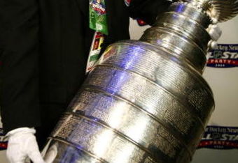 MONTREAL- JANUARY 23:  Steve Poirier of the Hockey Hall of Fame arrives with the Stanley Cup at The Hockey News / NHL All-Star party at Gare Dalhousie as part of the 2009 NHL All-Star Weekend on January 23, 2009 in Montreal, Quebec. (Photo by Phillip MacCallum/Getty Images)