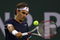 INDIAN WELLS, CA - MARCH 19: Roger Federer of Switzerland returns a backhand to Fernando Verdasco during the BNP Paribas Open at the Indian Wells Tennis Garden on March 19, 2009 in Indian Wells, California.  (Photo by Jeff Gross/Getty Images)