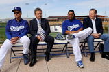 GLENDALE, AZ - MARCH 05:  Manny Ramirez #99 (2R) of the Los Angeles Dodgers manager Joe Torre #6 (L) general manager Ned Colletti and Ramirez's agent Scott Boras looks on during a news conference on March 5, 2009, at Camelback Ranch in Glendale, Arizona, after he re-signed with the Dodgers.  (Photo by Kevork Djansezian/Getty Images)