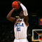 WESTWOOD, CA - MARCH 05:  Jrue Holiday #21 of the UCLA Bruins shoots the outside jump shot in the second half during their NCAA basketball game against the UCLA Bruins at Pauley Pavilion on March 5, 2009 in Westwood, California. The Bruins defeated the Beavers 79-54. (Photo by Victor Decolongon/Getty Images)