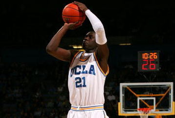 WESTWOOD, CA - MARCH 05:  Jrue Holiday #21 of the UCLA Bruins shoots the outside jump shot in the second half during their NCAA basketball game against the UCLA Bruins at Pauley Pavilion on March 5, 2009 in Westwood, California. The Bruins defeated the Beavers 79-54. (Photo by Victor Decolongon/Getty Images)