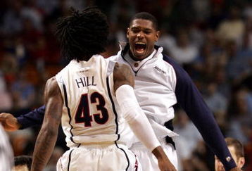 MIAMI - MARCH 22: Forward Jordan Hill #43 of the  University of Arizona Wildcats celebrates with a teammate during a time out in their game against the Cleveland State University Vikings during the second round of the NCAA Division I Men's Basketball Tournament at the American Airlines Arena on March 22, 2009 in Miami, Florida.  (Photo by Marc Serota/Getty Images)