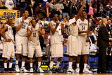 PHILADELPHIA - MARCH 21:  Kemba Walker #15, Jonathan Mandeldove #32, A.J. Price #12,  Stanley Robinson #21, Jeff Adrien #4 and Hasheem Thabeet #34 of the Connecticut Huskies show camaraderie for their team during the game against the Texas A&M Aggies during the second round of the NCAA Division I Men's Basketball Tournament at the Wachovia Center on March 21, 2009 in Philadelphia, Pennsylvania.  The Huskies defeated the Aggies 92-66.  (Photo by Jim McIsaac/Getty Images)