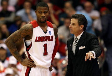 DAYTON, OH - MARCH 20: Head coach Rick Pitino speaks to Terrence Williams #1 of the Louisville Cardinals during a game against the Morehead State Eagles during the first round of the NCAA Division I Men's Basketball Tournament at the University of Dayton Arena on March 20, 2009 in Dayton, Ohio.  (Photo by Andy Lyons/Getty Images)