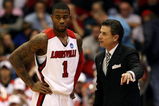 DAYTON, OH - MARCH 20: Head coach Rick Pitino speaks to Terrence Williams #1 of the Louisville Cardinals during a game against the Morehead State Eagles during the first round of the NCAA Division I Men's Basketball Tournament at the University of Dayton Arena on March 20, 2009 in Dayton, Ohio.  (Photo by Andy Lyons/Getty Images)