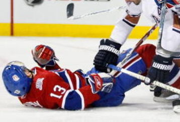 MONTREAL- MARCH 10:  Sheldon Souray #44 of the Edmonton Oilers body checks Alex Tanguay #13 of the Montreal Canadiens during the game at the Bell Centre on March 10, 2009 in Montreal, Quebec, Canada.  (Photo by Richard Wolowicz/Getty Images)