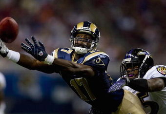 ST. LOUIS, MO - AUGUST 23: Donnie Avery #17 of the St. Louis Rams attempts to make a catch against Corey Ivy #35 of the Baltimore Ravens at the Edward Jones Dome August 23, 2008 in St. Louis, Missouri. (Photo by Dilip Vishwanat/Getty Images)