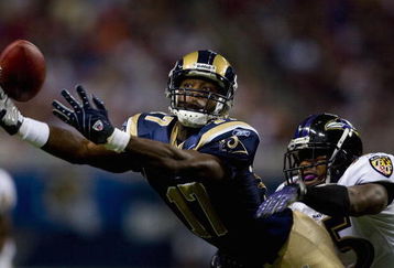 ST. LOUIS, MO - AUGUST 23: Donnie Avery #17 of the St. Louis Rams attempts to make a catch against Corey Ivy #35 of the Baltimore Ravens at the Edward Jones Dome August 23, 2008 in St. Louis, Missouri. (Photo by Dilip Vishwanat/Getty Images)