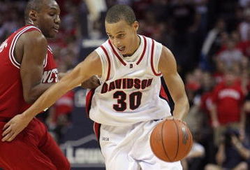 CHARLOTTE, NC - DECEMBER 6:  Stephen Curry #30 of the Davidson Wildcats drives during the game against the North Carolina State Wolfpack at Time Warner Cable Arena on December 6, 2008 in Charlotte, North Carolina. (Photo by Streeter Lecka/Getty Images)