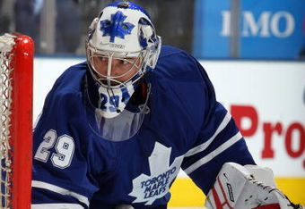TORONTO - MARCH 14:  Martin Gerber #29 of the Toronto Maple Leafs defends the net against the Calgary Flames during the game at Air Canada Centre on March 14, 2009 in Toronto, Ontario, Canada. (Photo by Dave Sandford/Getty Images)
