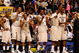 PHILADELPHIA - MARCH 21:  Kemba Walker #15, Jonathan Mandeldove #32, A.J. Price #12,  Stanley Robinson #21, Jeff Adrien #4 and Hasheem Thabeet #34 of the Connecticut Huskies show camaraderie for their team during the game against the Texas A&M Aggies during the second round of the NCAA Division I Men's Basketball Tournament at the Wachovia Center on March 21, 2009 in Philadelphia, Pennsylvania.  The Huskies defeated the Aggies 92-66.  (Photo by Jim McIsaac/Getty Images)