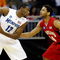 KANSAS CITY, MO - MARCH 21:   Tyreke Evans #12 of the Memphis Tigers looks to make a move against Sean Mosley #14 of the Maryland Terrapins in the first half during the second round of the NCAA Division I Men's Basketball Tournament at the Sprint Center on March 21, 2009 in Kansas City, Missouri. The Tigers defeated the Terrapins 89-70. (Photo by Jamie Squire/Getty Images)