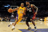 LOS ANGELES, CA - JANUARY 19:  Kobe Bryant #24 of the Los Angeles Lakers drives the ball against LeBron James #23 of the Cleveland Cavaliers during the forth quarter at Staples Center on January 19, 2009 in Los Angeles, California.  (Photo by Harry How/Getty Images)