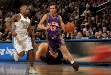 DENVER - MARCH 05:  Steve Nash #13 of the Phoenix Suns drives the ball upcourt as Anthony Carter #25 of the Denver Nuggets defends during NBA action at the Pepsi Center on March 5, 2008 in Denver, Colorado. The Nuggets defeated the Suns 126-113. NOTE TO USER: User expressly acknowledges and agrees that, by downloading and or using this photograph, user is consenting to the term and conditions of the Getty Images License Agreement.  (Photo by Doug Pensinger/Getty Images)