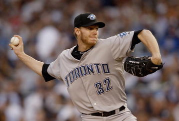 NEW YORK _ JUNE 3:  Roy Halladay #32 of the Toronto Blue Jays delivers a pitch during the game against the New York Yankees on June 3, 2008 at Yankee Stadium in the Bronx borough of New York City. (Photo by: Nick Laham/Getty Images)