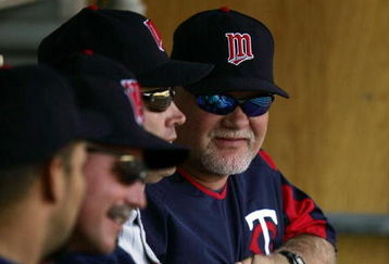 CHICAGO - JULY 06: Manager Ron Gardenhire #35 of the Minnesota Twins smiles at his team in the dugout during a game against the Chicago White Sox on July 6, 2007 at U.S. Cellular Field in Chicago, Illinois. The Twins defeated the White Sox 20-14. (Photo by Jonathan Daniel/Getty Images)