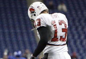 DETROIT - DECEMBER 05: Nate Davis #13 of the Ball State Cardinals reacts after fumbling the ball that was returned 92 yards for a touchdown by the Buffalo Bulls in the MAC Championship game on December 5, 2008 at Ford Field in Detroit, Michigan. (Photo by Gregory Shamus/Getty Images)