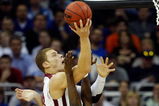 KANSAS CITY, MO - MARCH 21:  Blake Griffin #23 of the Oklahoma Sooners jumps to the basket for a lay up against Manny Harris #3 of the Michigan Wolverines in the second half during the second round of the NCAA Division I Men's Basketball Tournament at the Sprint Center on March 21, 2009 in Kansas City, Missouri.  The Sooners defeated the Wolverines 73-63. (Photo by Jamie Squire/Getty Images)