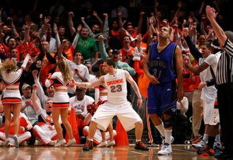 NEW YORK - MARCH 11:  Eric Devendorf #23 of the Syracuse Orange reacts between plays against the Seton Hall Pirates during the second round of the Big East Tournament at Madison Square Garden on March 11, 2009 in New York City.  (Photo by Jim McIsaac/Getty Images)