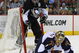 PITTSBURGH - MARCH 17: Evgeni Malkin #71 of the Pittsburgh Penguins is backed into by Johan Hedberg #1 of the Atlanta Thrashers at the Mellon Arena March 17, 2009 in Pittsburgh, Pennsylvania. The Penguins defeated the Thrashers 6-2. (Photo by Bruce Bennett/Getty Images)