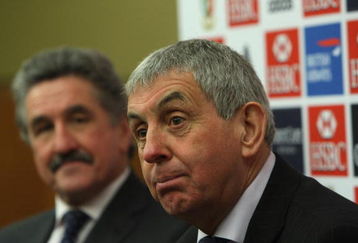 LONDON - DECEMBER 11:  Ian McGeechan, (R) the British and Irish Lions Tour head coach, watched by Tour Manager Gerald Davies faces the media during the Lions media briefing at the Heathrow Sofitel on December 11, 2008 in London, England.  (Photo by David Rogers/Getty Images)