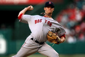 ANAHEIM, CA - JULY 18:  Pitcher Clay Buchholz #61 of the Boston Red Sox throws a pitch against the Los Angeles Angels of Anaheim on July 18, 2008 at Angel Stadium in Anaheim, California.    (Photo by Stephen Dunn/Getty Images)