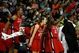 CLEVELAND - APRIL 01: (L-R) Kia Vaughn #15, Heather Zurich #21 and Matee Ajavon #22 of the Rutgers Scarlet Knights celebrate from the bench late inthe game against the LSU Lady Tigers during the National Semifinal game of the 2007 NCAA Women's Final Four at the Quicken Loans Arena on April 1, 2007 in Cleveland, Ohio. Rutgers won 59-35. (Photo by Gregory Shamus/Getty Images)