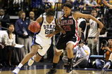 BOSTON - APRIL 04:  Monique Currie #25 of the Duke Blue Devils tries to drive around Marissa Coleman #25 of the Maryland Terrapins during the 2006 NCAA Women's Basketball Championship Game on April 4, 2006 at the TD Banknorth Garden in Boston, Massachusetts.  (Photo by Jim McIsaac/Getty Images)