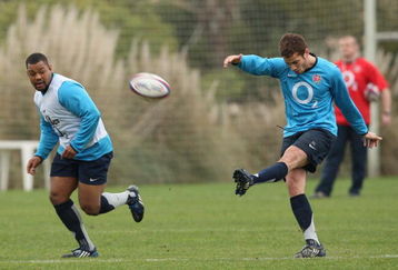 VILAMOURA, PORTUGAL - JANUARY 30:  Steffon Armitage watches Danny Cipriani clear the ball during the England training session held at Browns Sports Complex on January 30, 2009 in Vilamoura, Portugal.  (Photo by Warren Little/Getty Images)