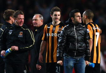 LONDON - MARCH 17: Brian Horton (3rd L), assistant manager of Hull, looks on as Cesc Fabregas comes onto the pitch after the the FA Cup Sponsored by E.on sixth round match between Arsenal and Hull City at Emirates Stadium on March 17, 2009 in London, England. (Photo by Ryan Pierse/Getty Images)