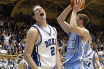 DURHAM, NC - FEBRUARY 7: Josh McRoberts #2 of the Duke University Blue Devils reacts on the court against Tyler Hansbrough #50 of the North Carolina Tar Heels during the game on February 7, 2007 at Cameron Indoor Stadium in Durham, N.C. North Carolina won 79-73. (Photo by Grant Halverson/Getty Images)