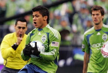 SEATTLE - MARCH 19:  Fredy Montero #17 of the Seattle Sounders FC accidentaly catches the ball in the first half of their opening match against the New York Red Bulls at Qwest Field March 19, 2009 in Seattle, Washington.  (Photo by Robert Giroux/Getty Images)