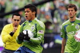SEATTLE - MARCH 19:  Fredy Montero #17 of the Seattle Sounders FC accidentaly catches the ball in the first half of their opening match against the New York Red Bulls at Qwest Field March 19, 2009 in Seattle, Washington.  (Photo by Robert Giroux/Getty Images)