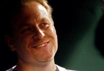 BOSTON - OCTOBER 16:  Curt Schilling of the Boston Red Sox looks on before game five of the American League Championship Series against the Tampa Bay Rays during the 2008 MLB playoffs at Fenway Park on October 16, 2008 in Boston, Massachusetts.  (Photo by Jim Rogash/Getty Images)
