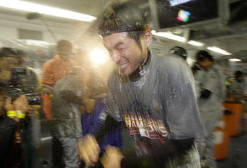 LOS ANGELES, CA - MARCH 23:  Ichiro Suzuki #51 of Japan is sprayed with champagne in the locker room after defeating Korea 3-5 in the finals of the 2009 World Baseball Classic on March 23, 2009 at Dodger Stadium in Los Angeles, California. Japan won 5-3 in 10 innings.  (Photo by Pool/Getty Images)