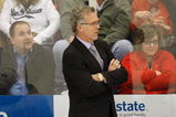 DETROIT - NOVEMBER 17:  Head Coach Craig MacTavish of the Edmonton Oilers looks on with his players Marc-Antoine Pouliot #78 and Kyle Brodzkiak #51 from the bench area during their NHL game against the Detroit Red Wings on November 17, 2008 at Joe Louis Arena in Detroit, Michigan. The Red Wings defeated the Oilters 4-0. (Photo by Gregory Shamus/Getty Images)