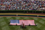 WILLIAMSPORT, PA - AUGUST 24: A flag is unfolded during the National Anthem before the United States takes on Mexico during the Little League World Series Championship game at Lamade Stadium on August 24, 2008 in Williamsport, Pennsylvania. The United States defeated Mexico 12-3.  (Photo by Doug Benc/Getty Images)